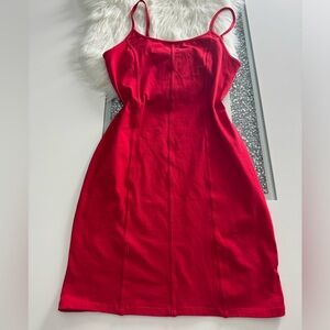 Mini dress, size L color red ,adjustable fabric to the body, stretches very well